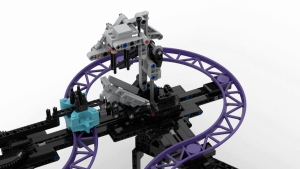Peanuts - a LEGO Great Ball Contraption module from Akiyuki | GBC balls are grabbed by two arms standing about a LEGO rollercoaster track | building instructions and LEGO kits on Planet GBC