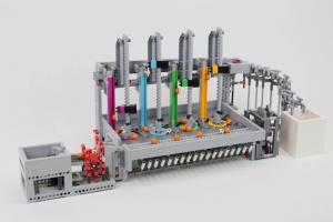 LEGO GBC from Akiyuki - Pole Dancing Quartet featuring four colorful vertical ramps that GBC balls are climbing | Building instructions and LEGO kits available on Planet GBC