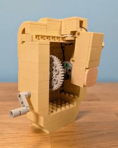 LEGO Automaton Flipping the Brick, an amazing animated mechanical machine designed by DavidBuildsTheBricks | building instructions and kits available on Planet GBC