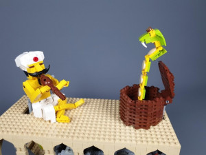 LEGO Automata Snake Charmer by TonyFlow76 | featuring a fakir and a snake basket | LEGO pdf building instructions and ready-to-build LEGO set available on Planet GBC